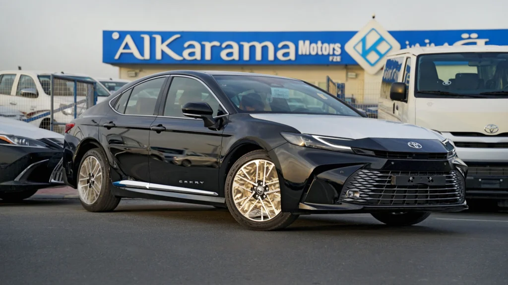 2026 Toyota Camry Lumiere hybrid sedan displayed at Al Karama Motors in Dubai