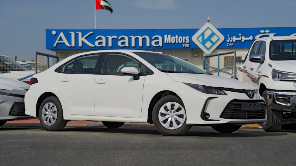 2026 Toyota Corolla XLI E sedan displayed at Al Karama Motors in Dubai