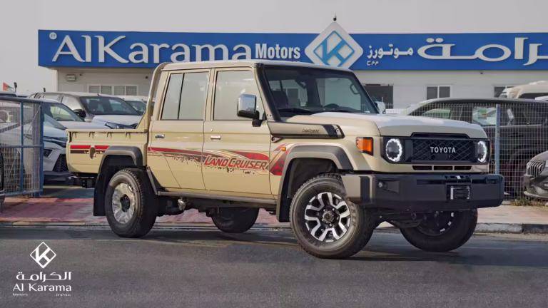Beige 2026 Toyota LC79 4.0L Double Cabin pickup front-side view at Al Karama Motors Dubai