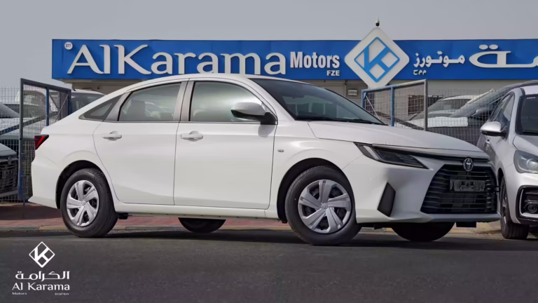 White 2026 Toyota Yaris Sedan front-side view at Al Karama Motors Dubai