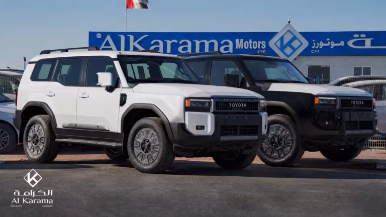 2026 Toyota Land Cruiser Prado with white and black models at Al Karama Motors Dubai