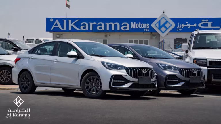 2026 Chery Arrizo 5S white and grey sedans parked in front of Al Karama Motors showroom in Dubai