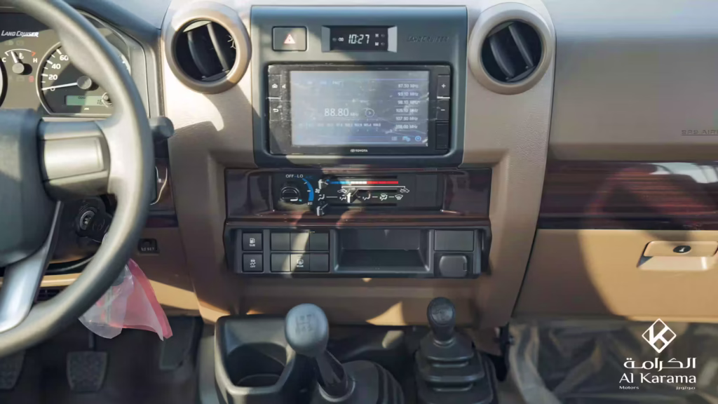 Touchscreen infotainment and manual air-conditioning controls in 2026 Toyota LC78
