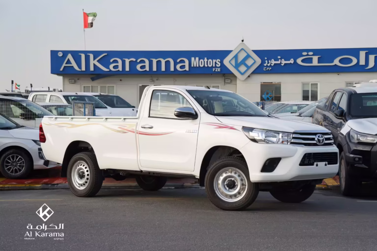 2026 Toyota Hilux 2.7L Petrol Manual 4x4 Single Cab pickup in white with steel wheels and chrome mirrors.