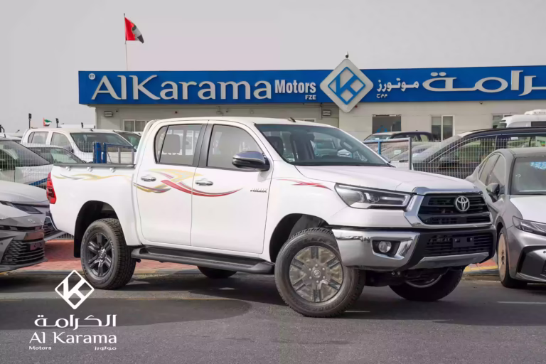 2026 Toyota Hilux SR5 Double Cab 4x4 white pickup front left exterior view