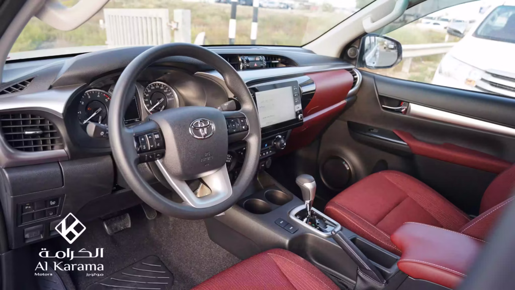 Toyota Hilux GLX-S steering wheel dashboard and red interior