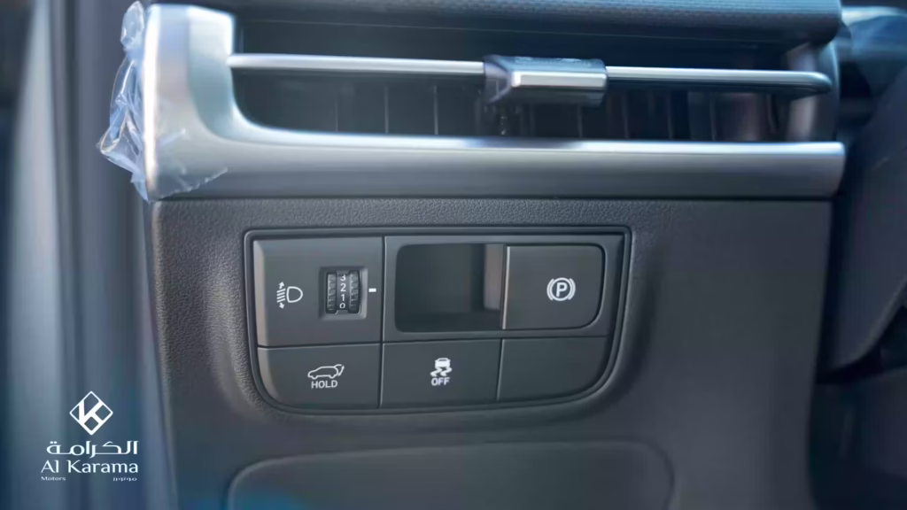 Hyundai Tucson dashboard parking and safety control buttons