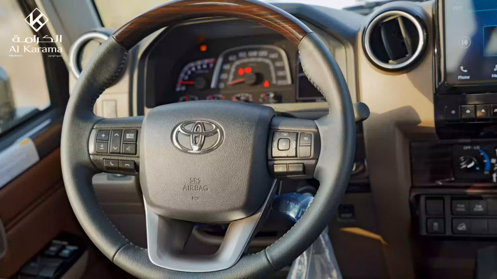 Toyota Land Cruiser LC79 multifunction steering wheel with wood trim
